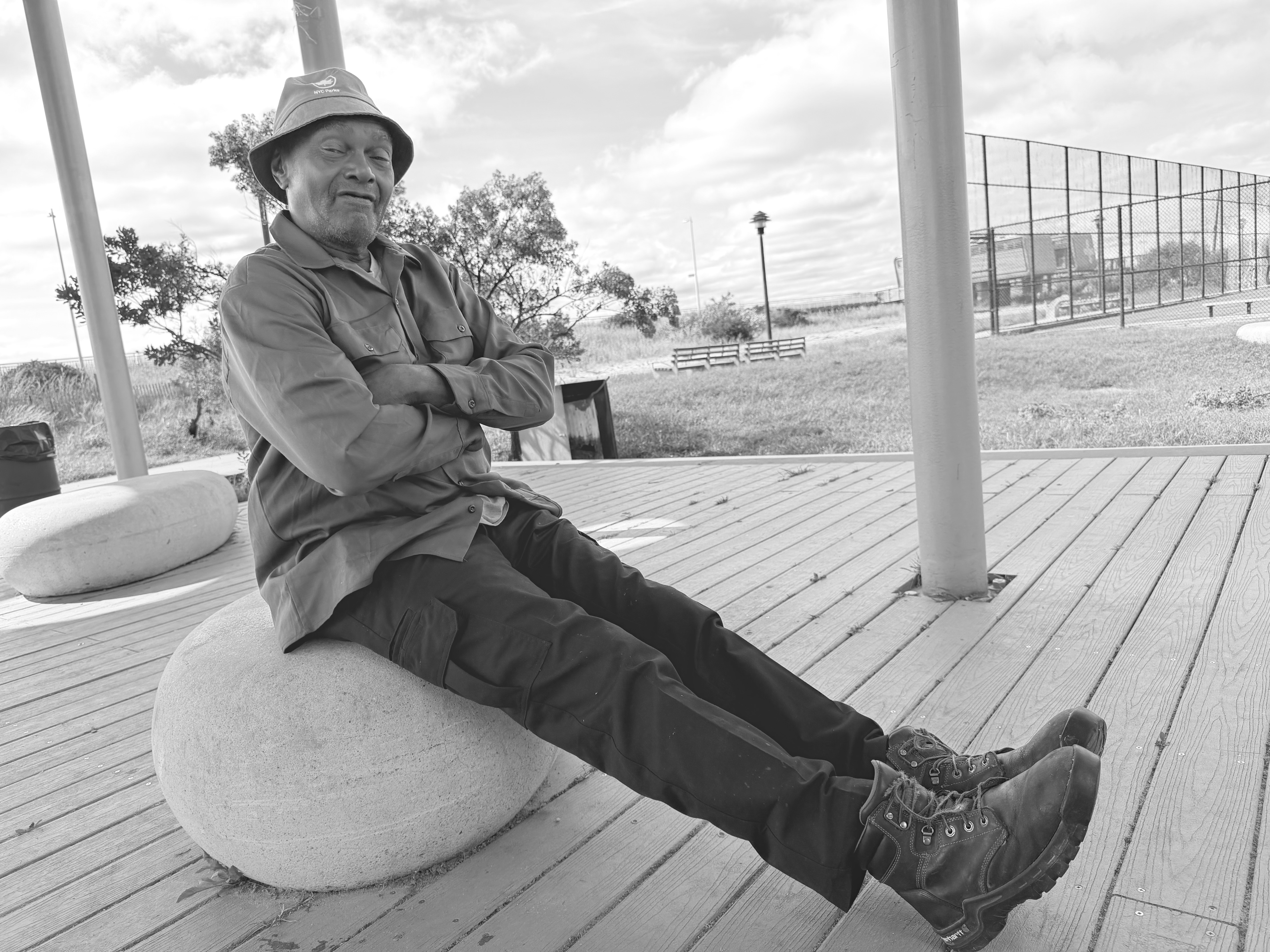Kenneth Harris seated outdoors